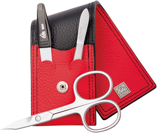 Taschen-Etui Colorado mit Nagelschere, Feile, Pinzette. Rotes Leder, schwarzer Deckel. Silberfarbene Werkzeuge. Logo.