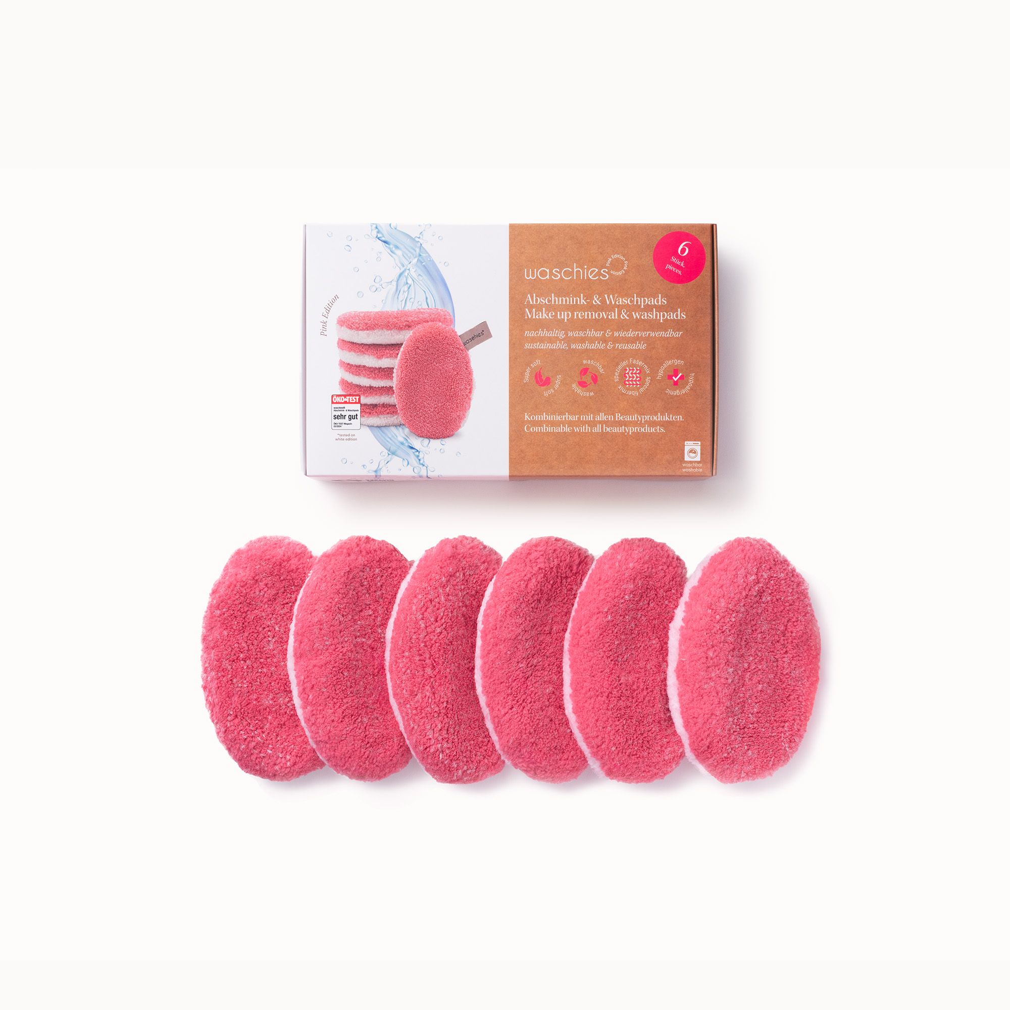 Eine Schachtel mit pinken Abschminkpads. Auf der Schachtel steht "waschies". Darunter liegen sechs Pads.