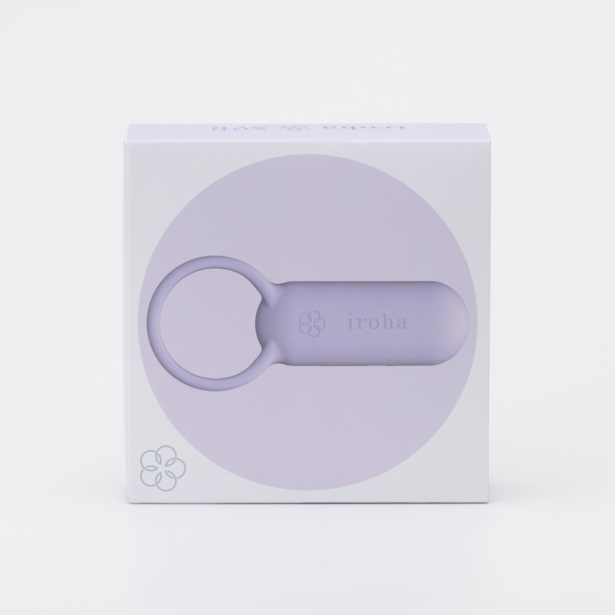 Verpackung des Paar-Vibrators. Lila Produkt in weißer Schachtel. Marke iroha, Blüten-Logo.