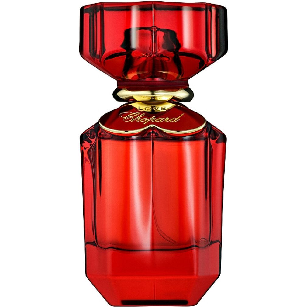 Roter Flakon mit goldfarbenem Verschluss. Aufschrift: Love Chopard. Geometrische Form.