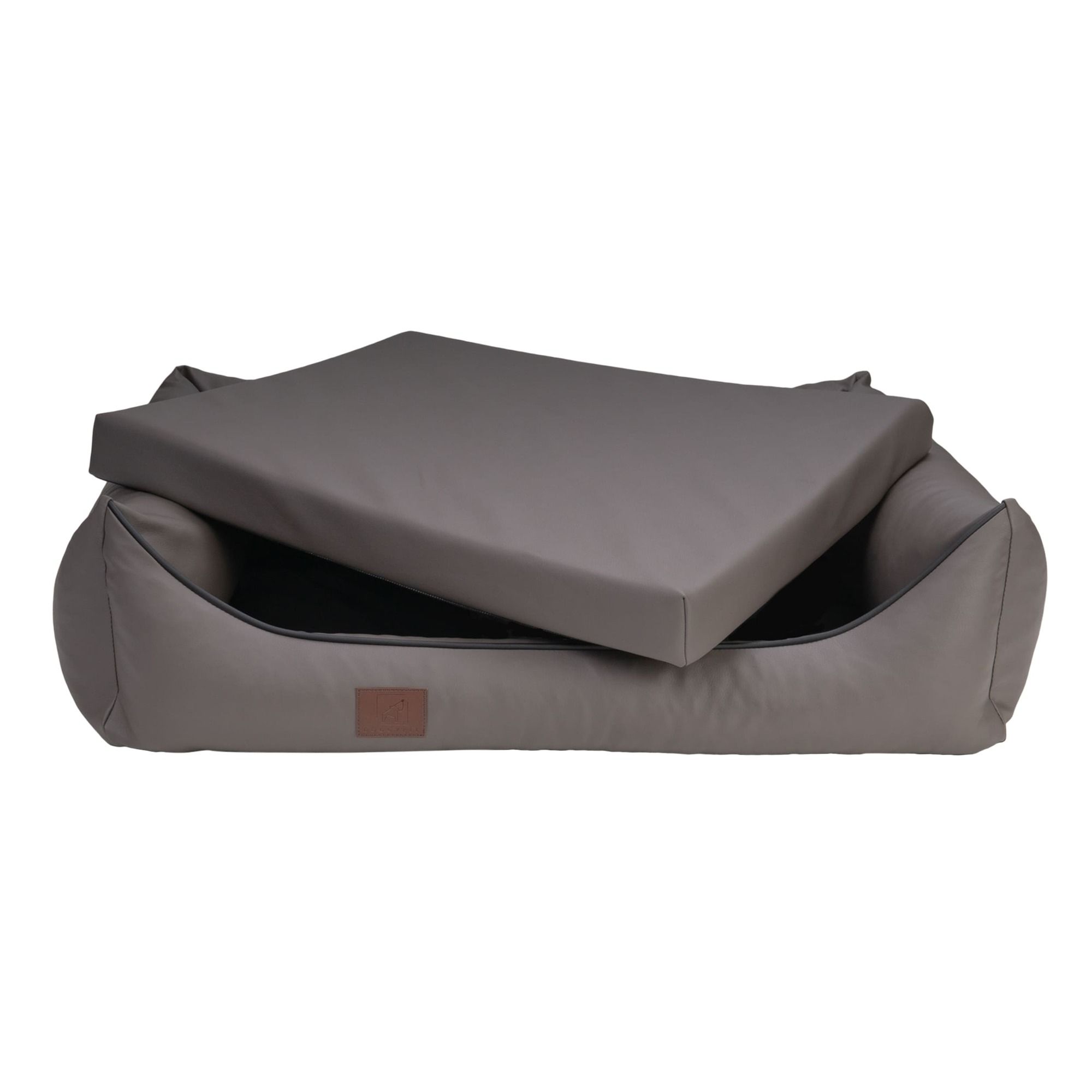 Hundebett, Kunstleder, Farbe Taupe. Deckel geöffnet. Rechteckige Form. Braunes Label.