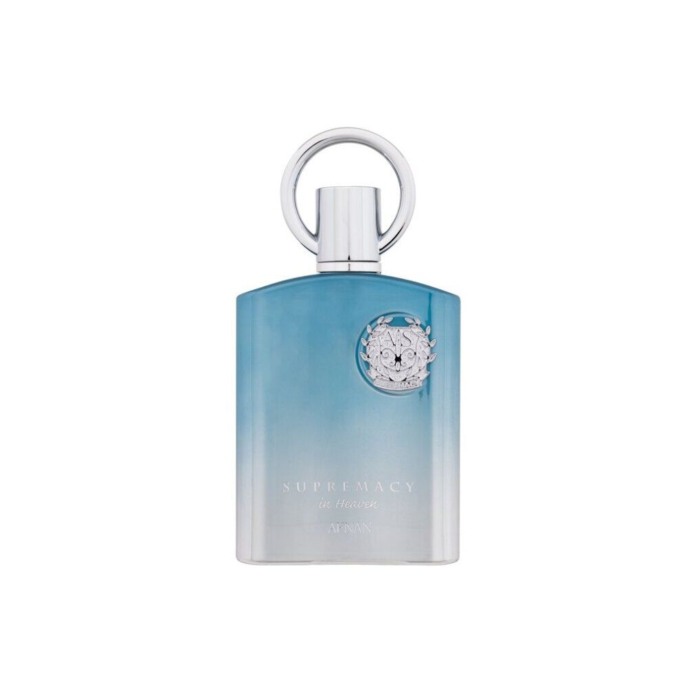 Hellblaues Eau de Parfum mit silbernem Verschluss. Aufschrift: Supremacy in Heaven, Afnan. Flakon.