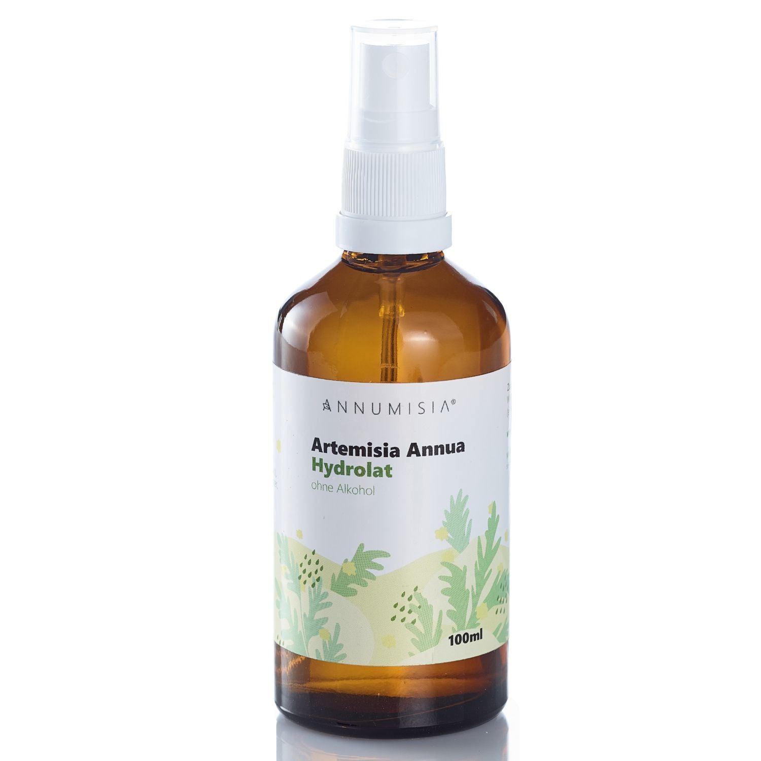 Braune Glasflasche mit weißem Etikett. Aufschrift: ANNUMISIA®, Artemisia Annua Hydrolat, ohne Alkohol. Sprühkopf.