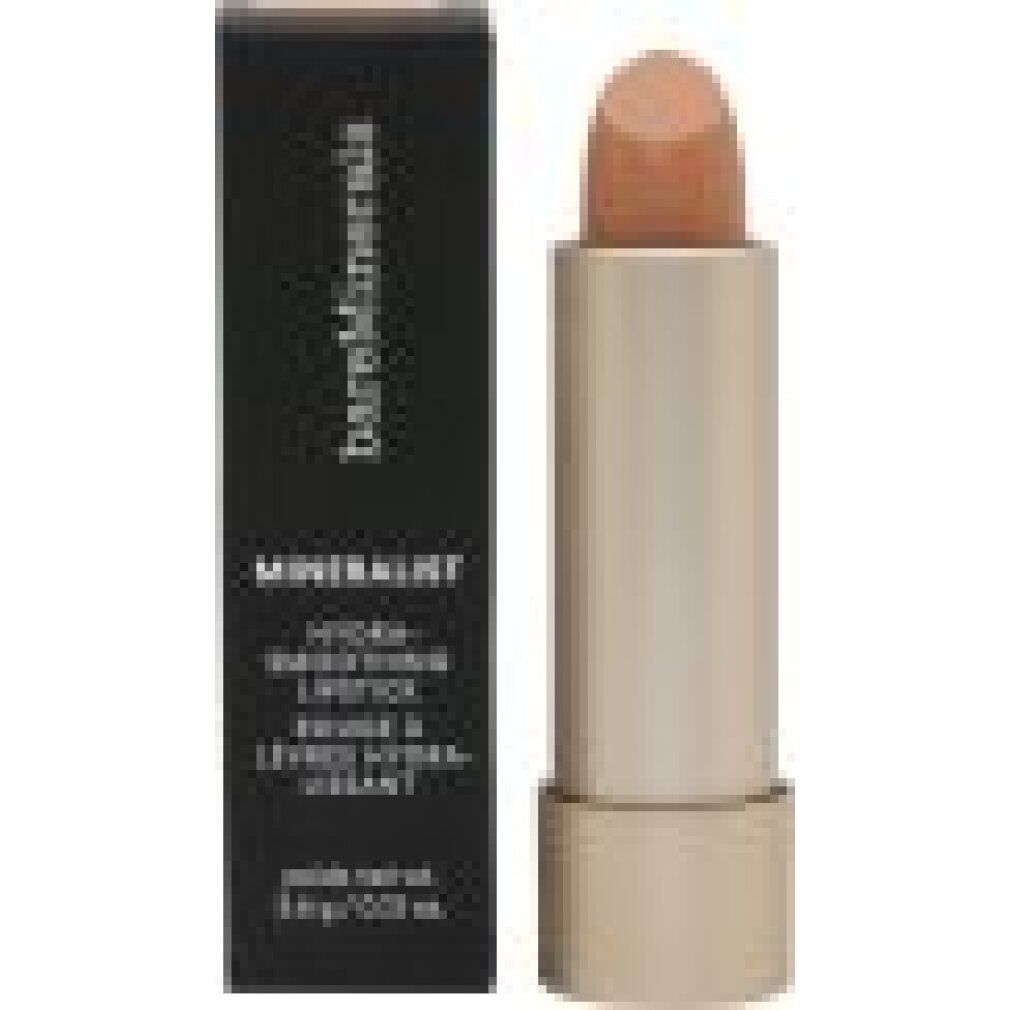 Lippenstift neben schwarzer Verpackung. Goldfarbene Hülse mit Schriftzug "bareMinerals". Auf der Verpackung steht "MINERALIST".
