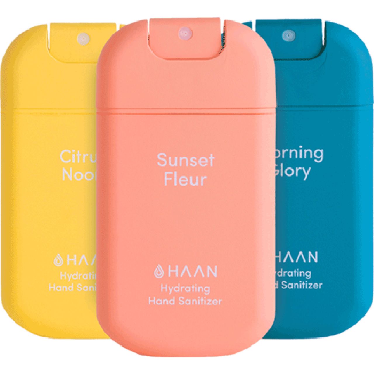Drei farbige Handdesinfektionsmittel nebeneinander. Gelb, rosa und blau. Aufschrift: Citrus Noon, Sunset Fleur, Morning Glory.