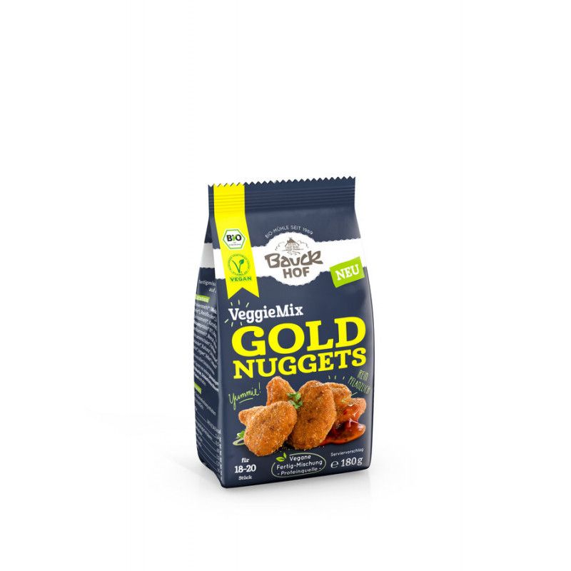 Dunkelblaue Verpackung mit "Bauckhof VeggieMix Gold Nuggets Bio". Vegan-Logo, "Neu"-Label. Gebratene Nuggets abgebildet.