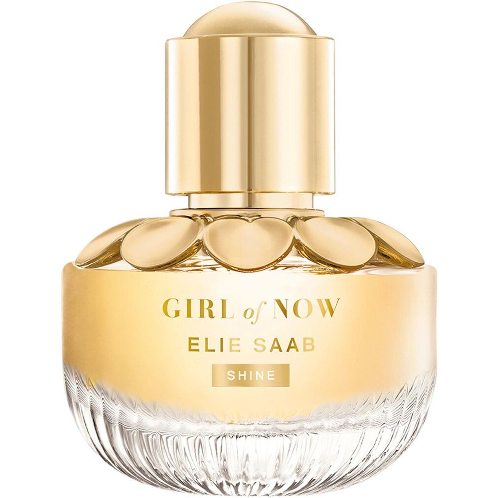 Parfümflakon mit goldfarbenem Deckel und blütenförmigem Design. Aufschrift 'GIRL of NOW' und 'ELIE SAAB'.