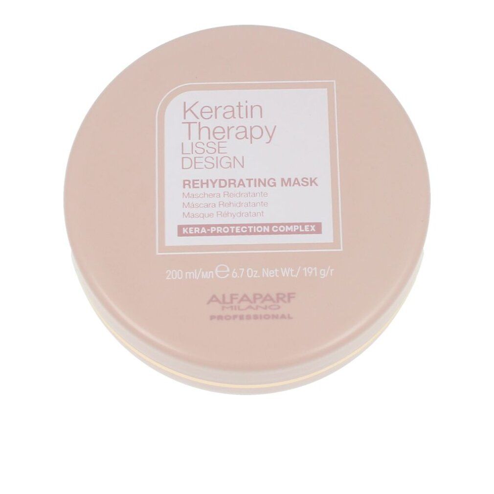 Runde, rosafarbene Dose mit Keratin Therapy Lisse Design Rehydrating Mask. Enthält KERA-PROTECTION COMPLEX.