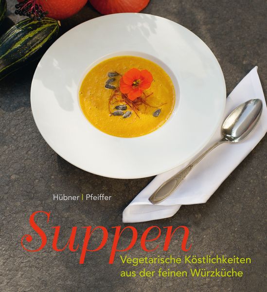 Buchcover mit dem Titel "Suppen". Darunter steht "Vegetarische Köstlichkeiten aus der feinen Würzkuche". Auf dem Cover eine Suppe mit Blüte.