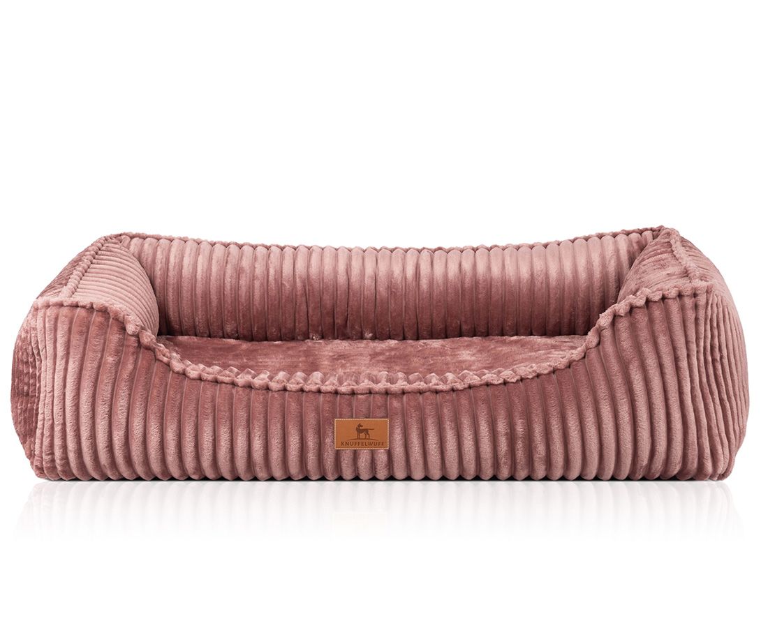 Orthopädisches Hundebett Sedona, rosa. Cord-Optik, rechteckig mit erhöhten Seiten. Label mit Logo. Weiche Oberfläche.