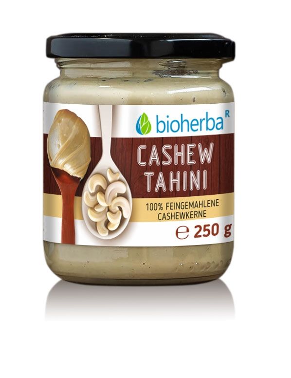 Glas mit Cashew Tahini. Schwarzer Deckel. Logo und Produktname: Cashew Tahini. 100% feingemahlene Cashewkerne. Inhalt: 250 g.