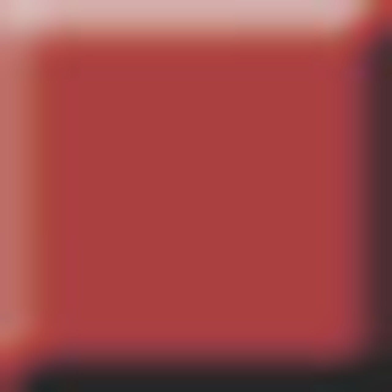 Einfarbiger, roter Hintergrund. Der Hintergrund ist unscharf.