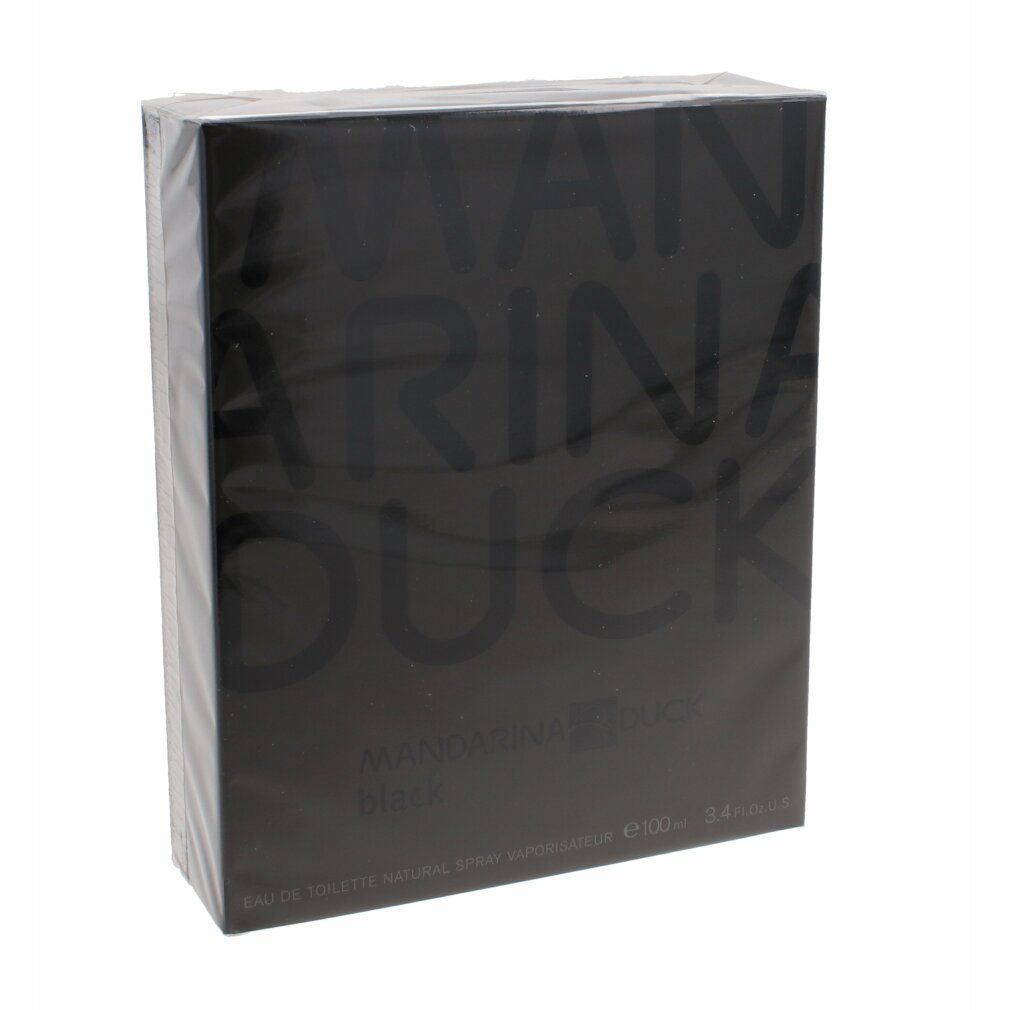 Schwarze Schachtel in Folie verpackt. Aufschrift: MAN, ARINA, DUCK, darunter BLACK. Produktinformationen.