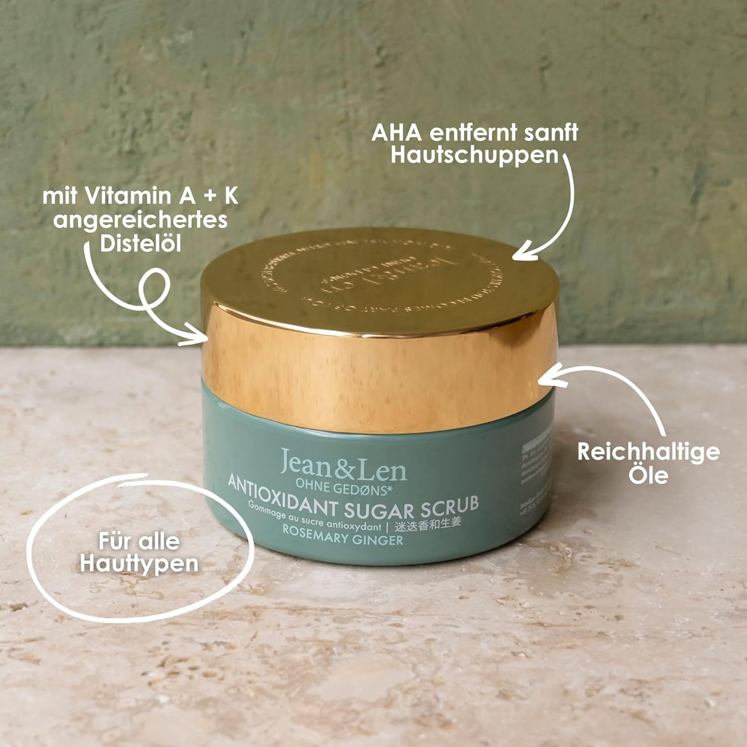Tiegel mit Jean & Len Logo. Beschriftung: Antioxidant Sugar Scrub. Inhaltsstoffe: Distelöl, reichhaltige Öle. Für alle Hauttypen.