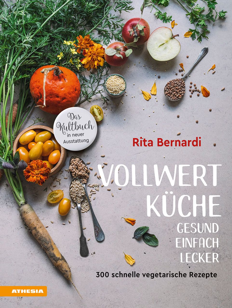 Buchcover mit Gemüse und Obst. Titel: VOLLWERT KÜCHE. Autorin: Rita Bernardi. Untertitel: Gesund, einfach, lecker. 300 vegetarische Rezepte.