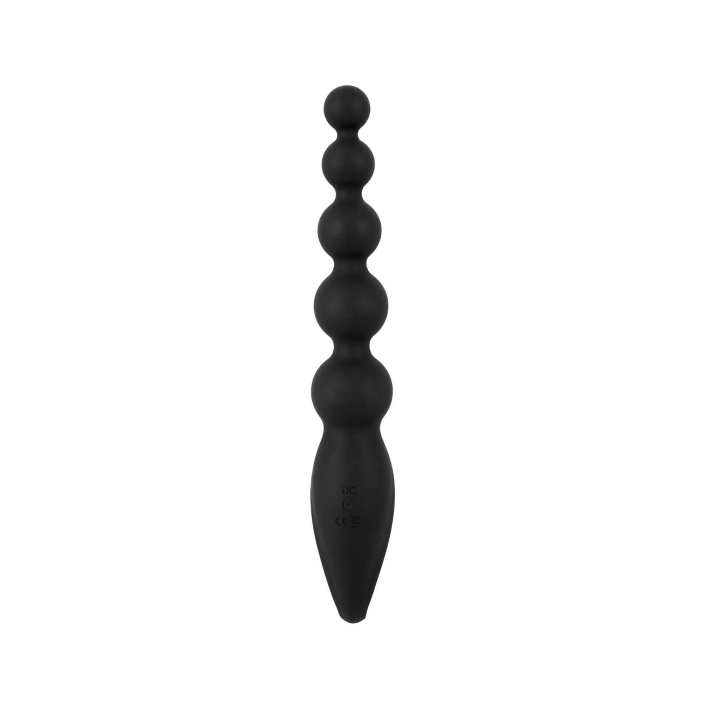 Schwarze Anal Beads mit Vibration, isoliert auf weißem Hintergrund, kugelförmige Glieder.