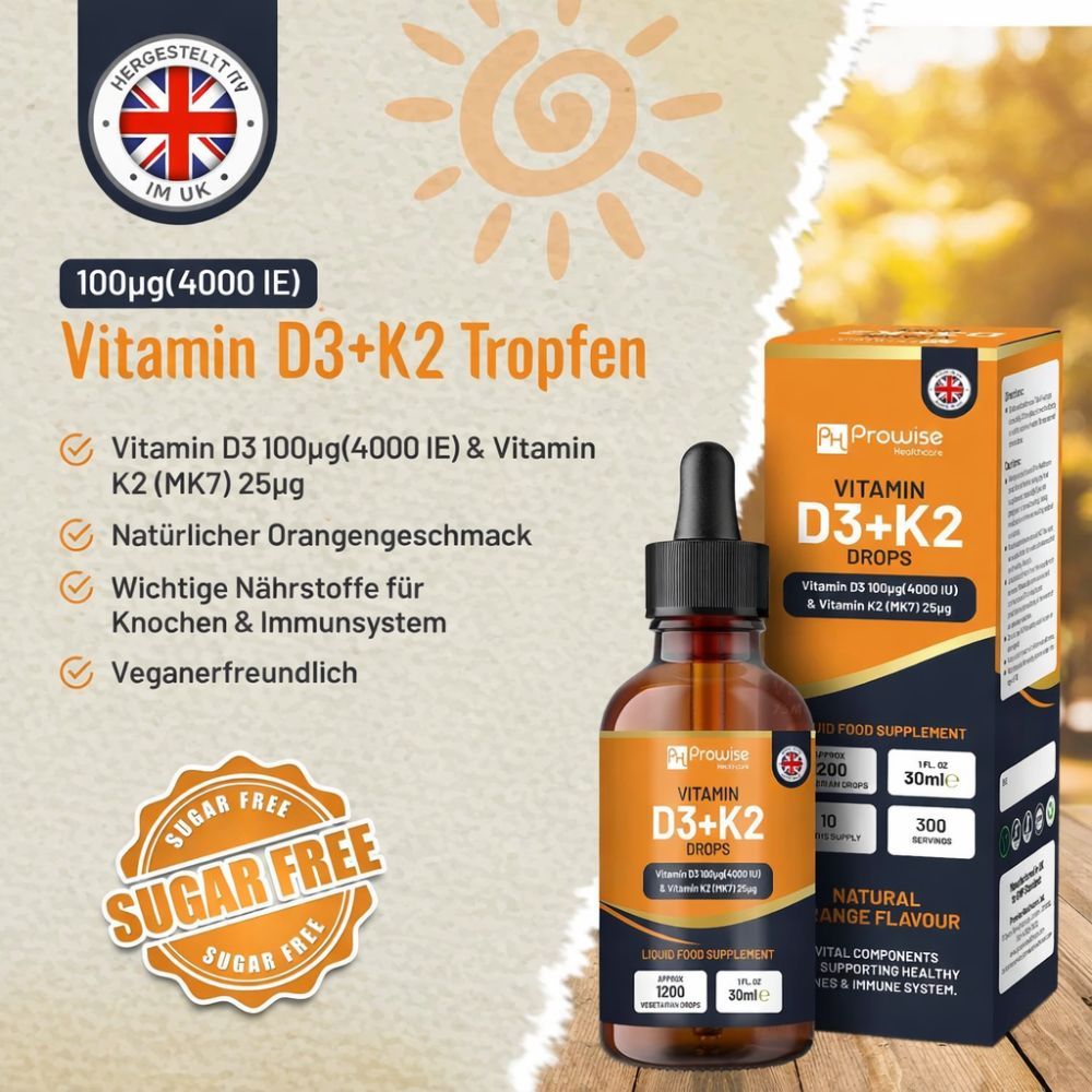 Braune Glasflasche mit schwarzem Tropfer und orangefarbenem Etikett. Aufschrift: Vitamin D3+K2 Tropfen.  Zusätzlich eine orangefarbene Schachtel.
