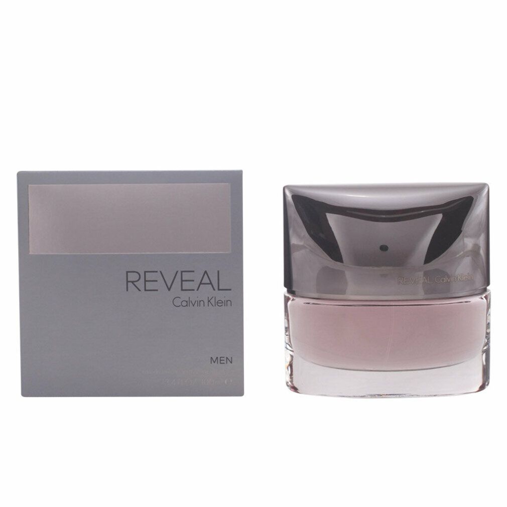 Flakon und Verpackung von Reveal Calvin Klein Men. Rechteckiger Flakon mit silbernem Deckel. Graue Verpackung mit Schriftzug Reveal.