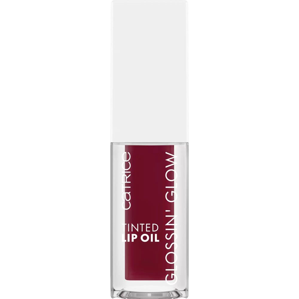 Getöntes Lippenöl in einer transparenten Flasche. Aufschrift: TINTED LIP OIL, GLOSSIN' GLOW, Catrice.
