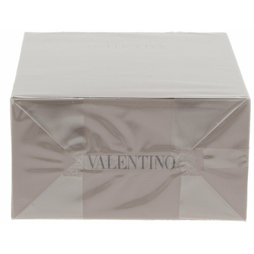 Verpackung von Valentino Uomo Eau de Toilette. Transparente Folie umhüllt die graue Box. Valentino-Logo sichtbar.
