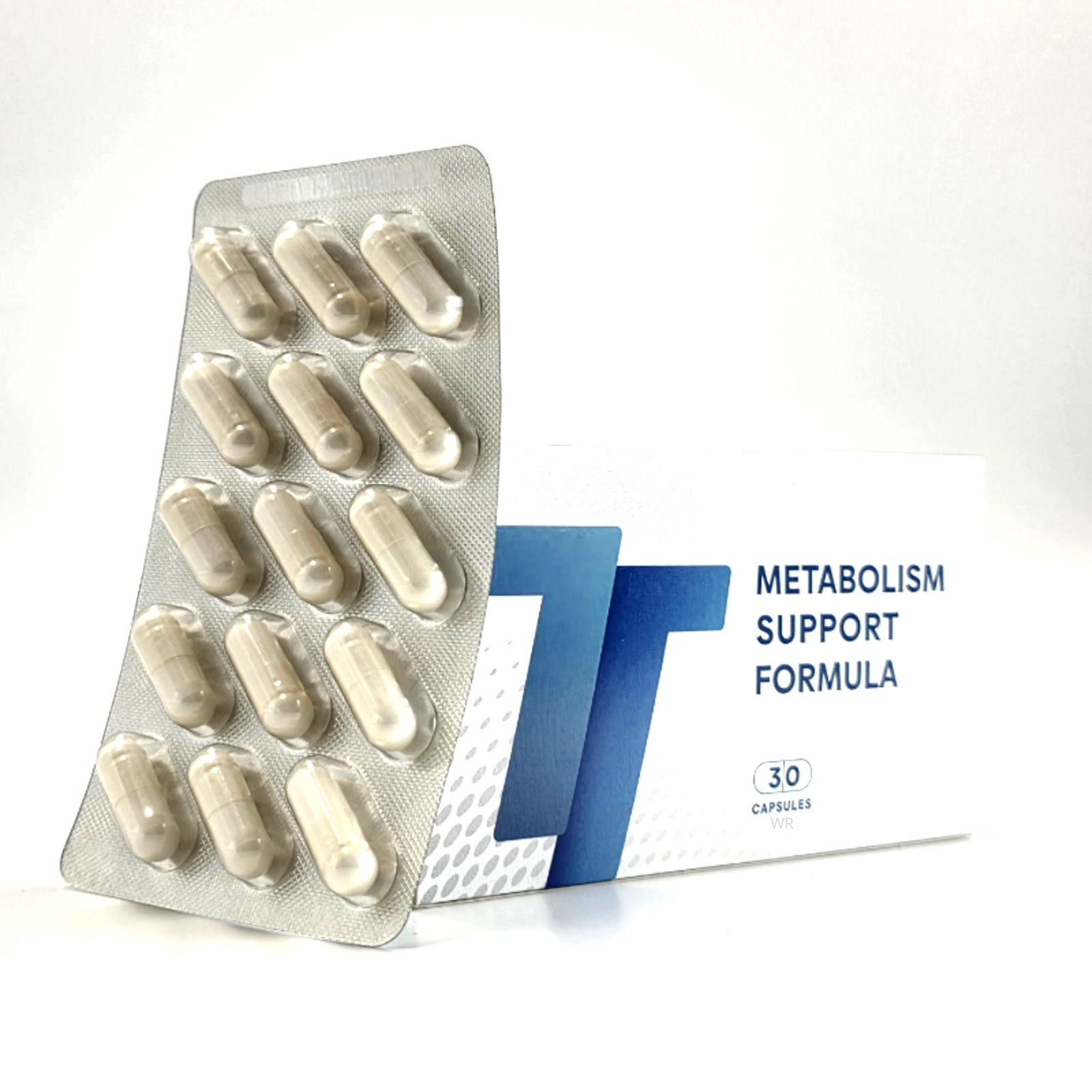 Blisterpackung mit Kapseln neben Schachtel "METABOLISM SUPPORT FORMULA". 30 Kapseln. Weißer Hintergrund.