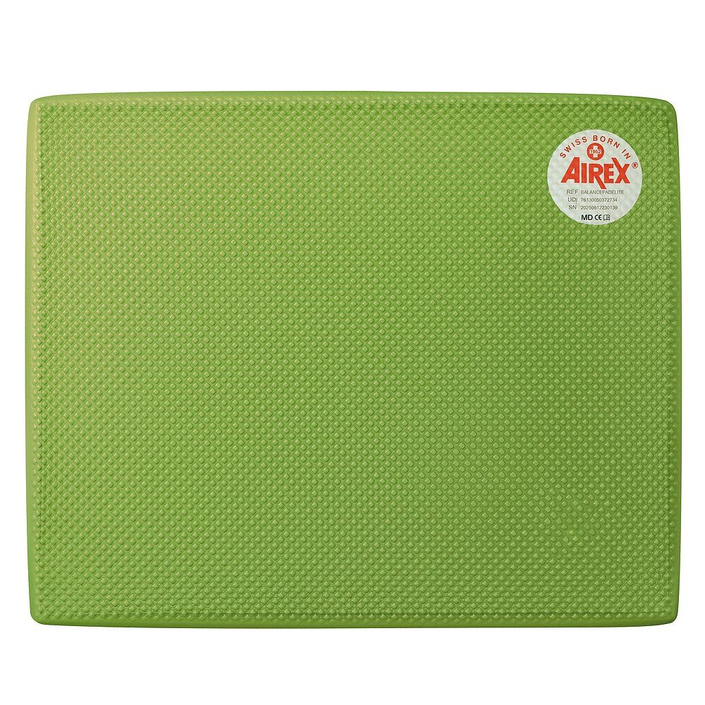 Grünes Balance-Pad mit strukturierter Oberfläche. Abgerundete Ecken. Airex-Logo-Aufkleber rechts oben.