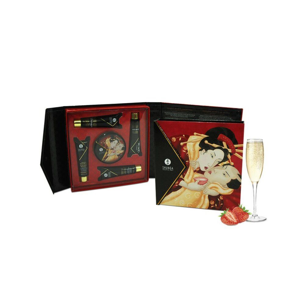 Geschenkset mit Cremes, Kerze, Dose, Erdbeeren und Sektglas. Geisha-Illustration auf der Verpackung. Schwarze Tuben.