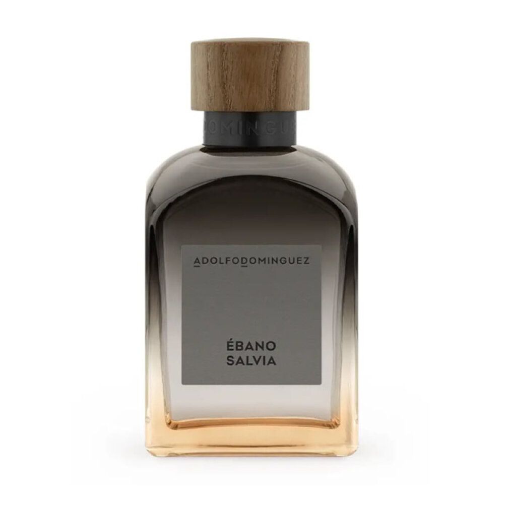 Parfümflasche mit Holzverschluss. Aufschrift: ADOLFODOMINGUEZ, ÉBANO SALVIA. Farbverlauf von Braun zu Gold.