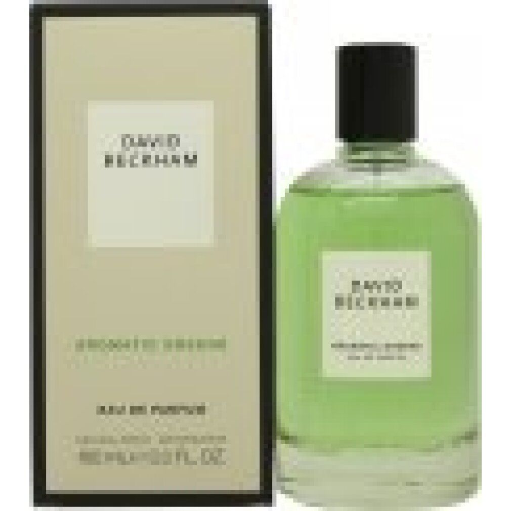 Parfümflasche und Verpackung. Flasche mit grünem Inhalt, weißes Etikett mit "DAVID BECKHAM AROMATIC GREENS".