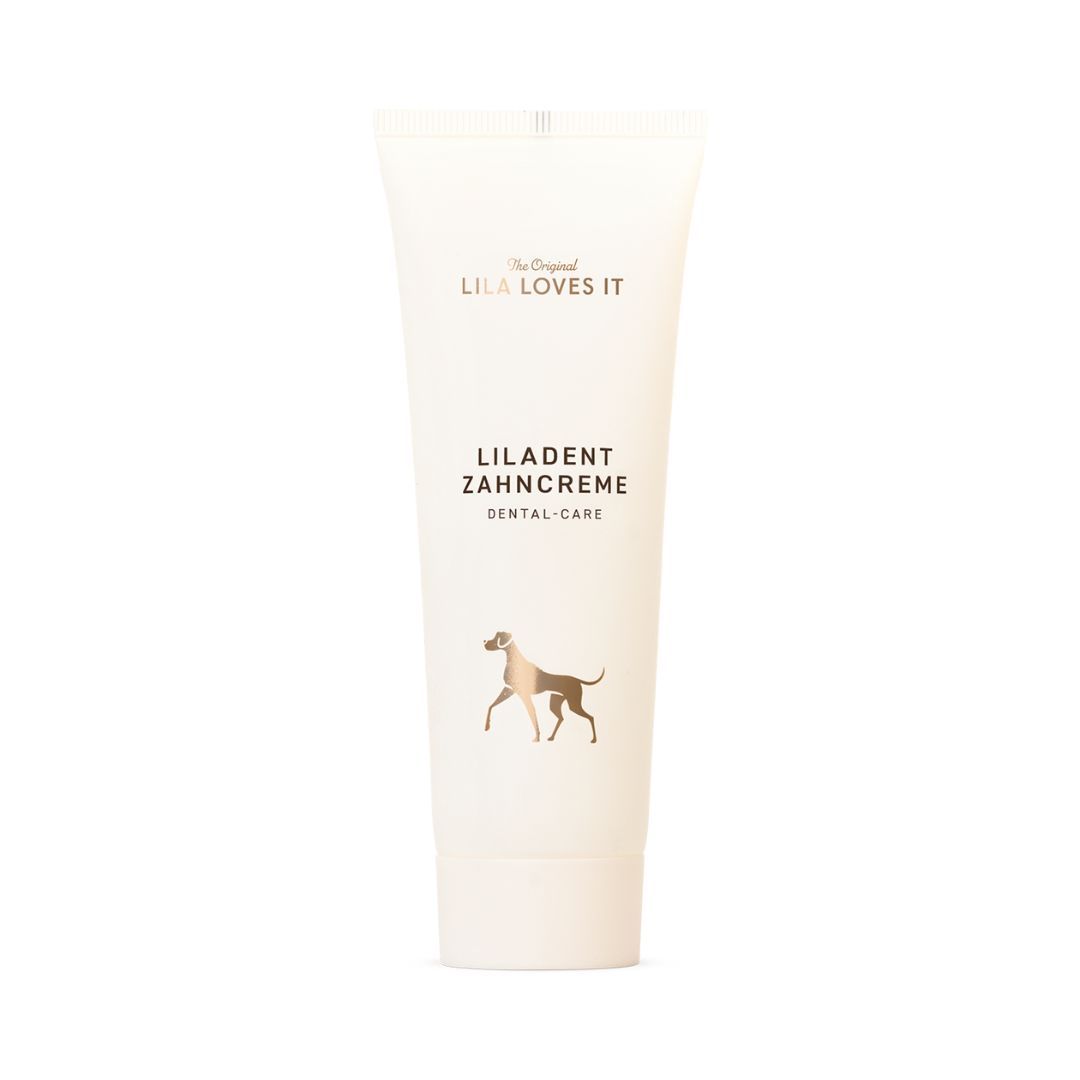 Weiße Tube Liladent Zahncreme. Brauner Aufdruck: Markenname, Produktname, Hund. Dental-Care.