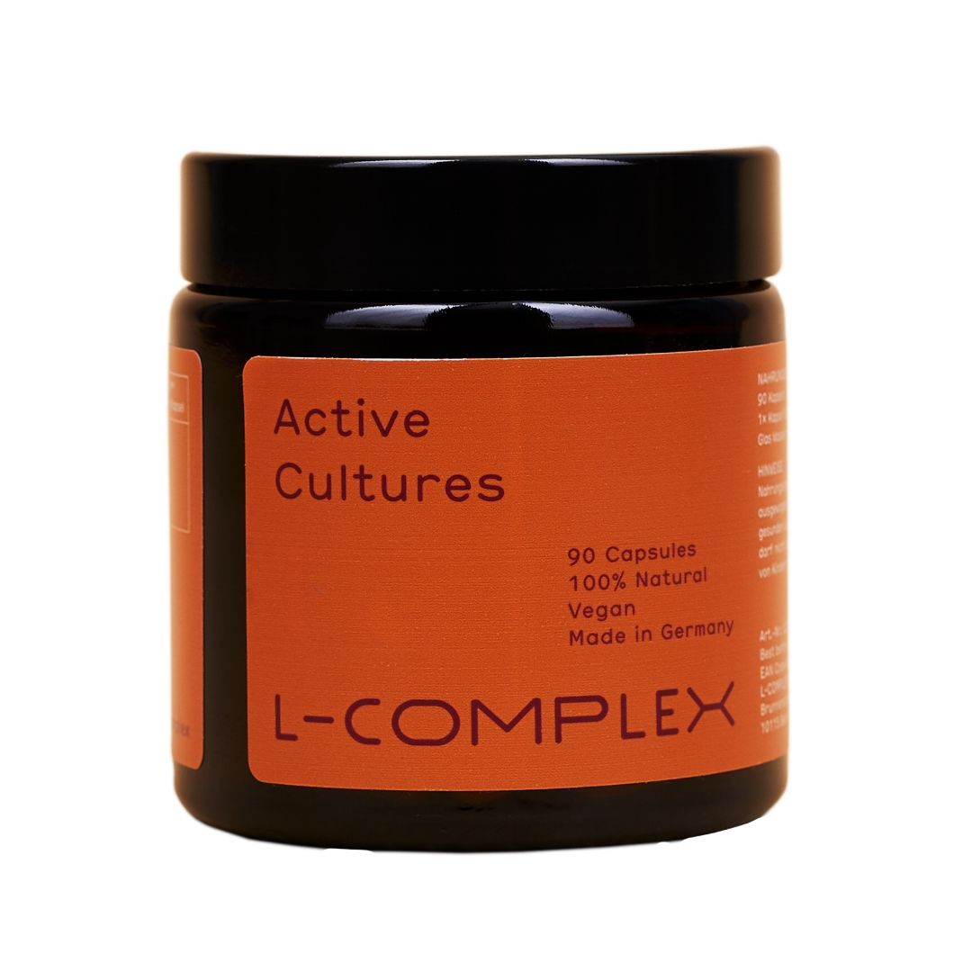 Braune Dose mit orangefarbenem Etikett. Aufschrift: Active Cultures, L-COMPLEX. Schwarzer Deckel. 90 Kapseln, vegan, hergestellt in Deutschland.