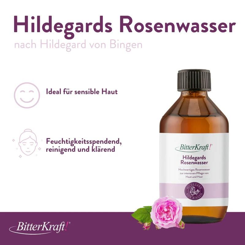 Produktflasche neben Rose. Text: Hildegards Rosenwasser, ideal für sensible Haut. BitterKraft! Logo.