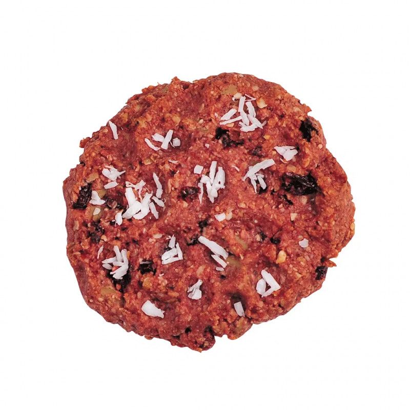 Keks mit Kokosraspeln. Runde Form, rote Farbe. Zutaten sichtbar.