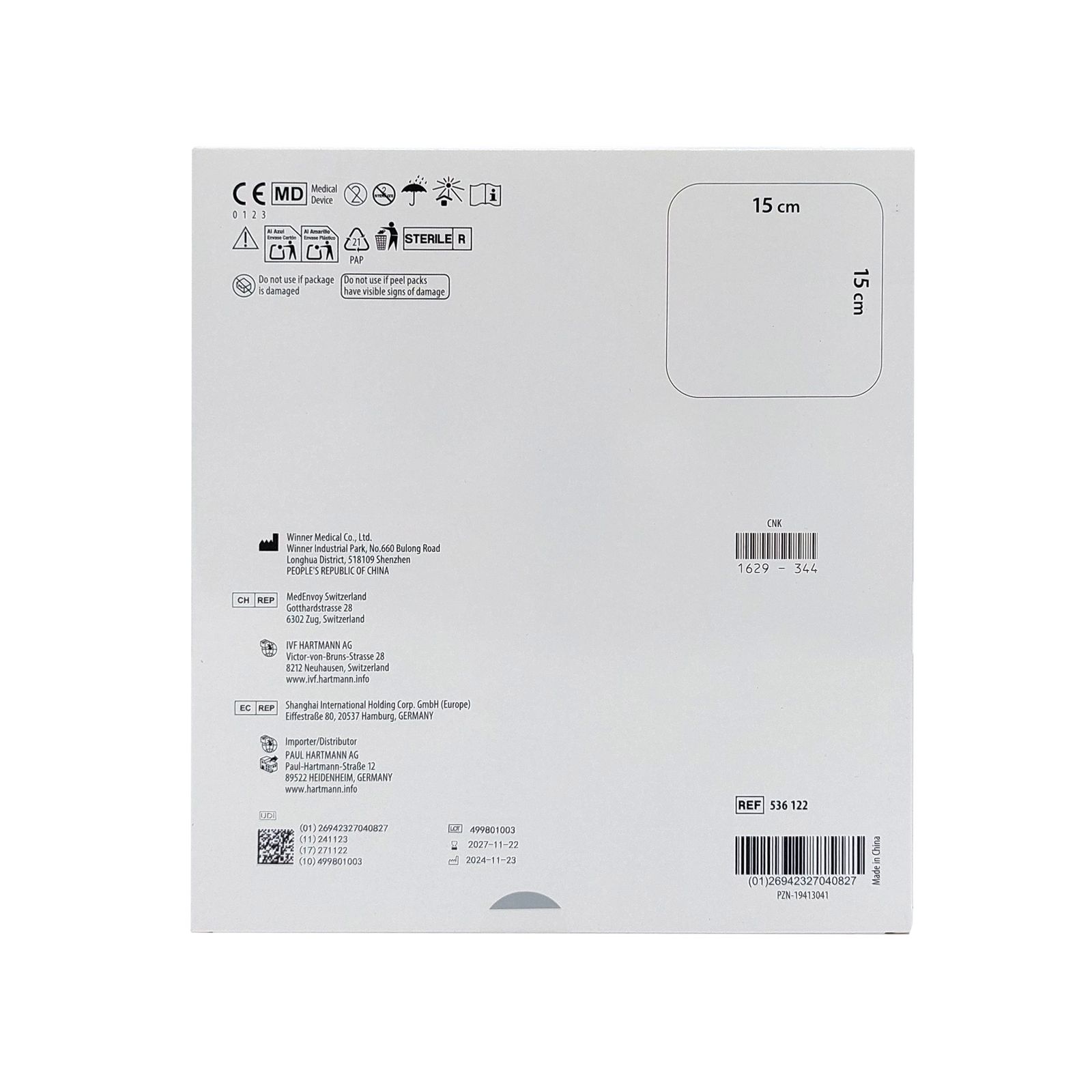 Verpackung, weiß, mit Produktinformationen und CE-Kennzeichnung. Abmessungen 15 x 15 cm sind angegeben. Steril.