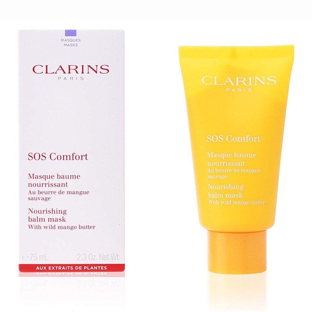Gelbe Tube und Verpackung. Aufschrift: Clarins Paris, SOS Comfort, Masque baume nourrissant, Nourishing balm mask.