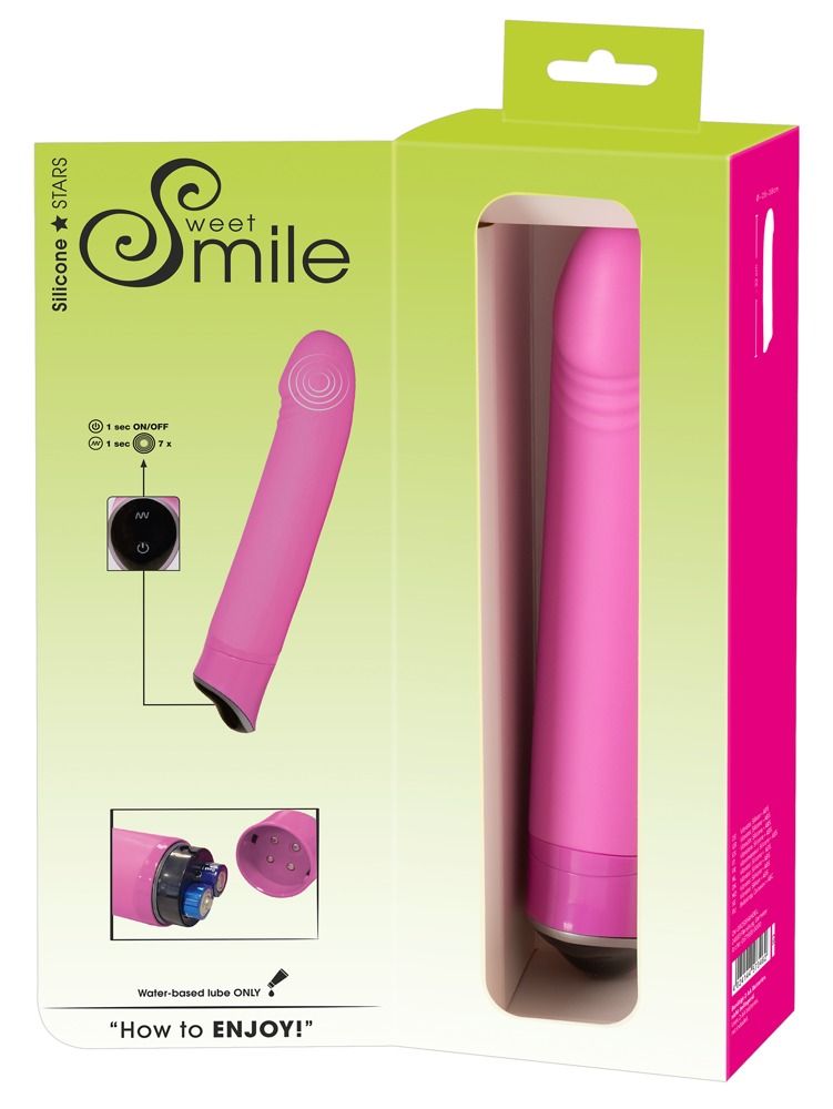 Pinkfarbener Vibrator in Verpackung. Aufschrift: Sweet Smile. Verpackung mit Aufhänger. Produktname und Logo sichtbar.