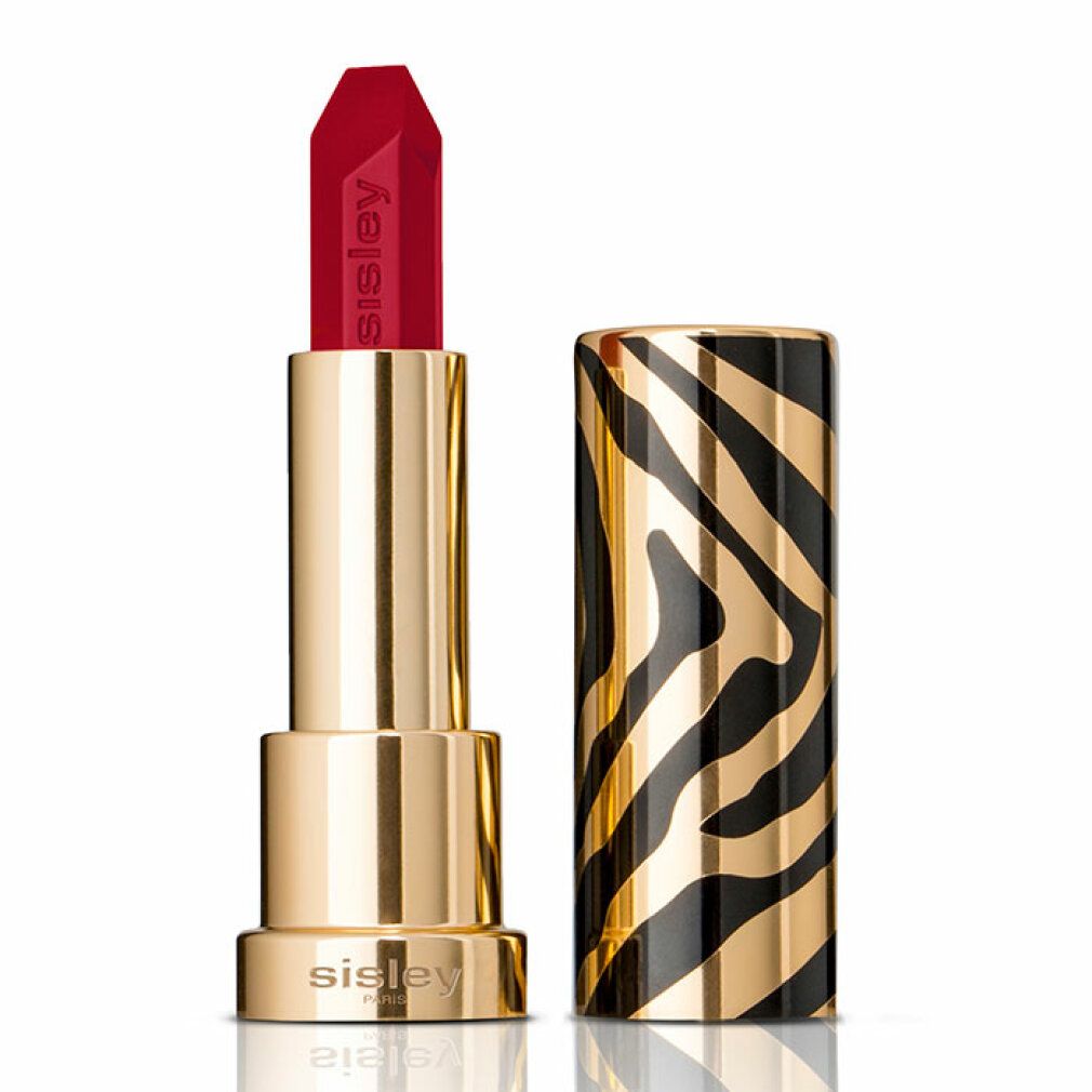 Sisley Le Phyto Rouge Lippenstift, geöffnet. Goldfarbener Stift, roter Lippenstift, schwarze und goldene Zebra-Hülle. Sisley-Logo auf dem Stift.
