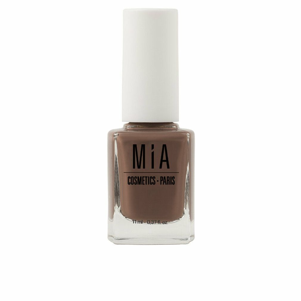 Nagellackflasche mit brauner Farbe und weißem Deckel. Aufschrift: Mía Cosmetics Paris. Volumen: 11 ml.