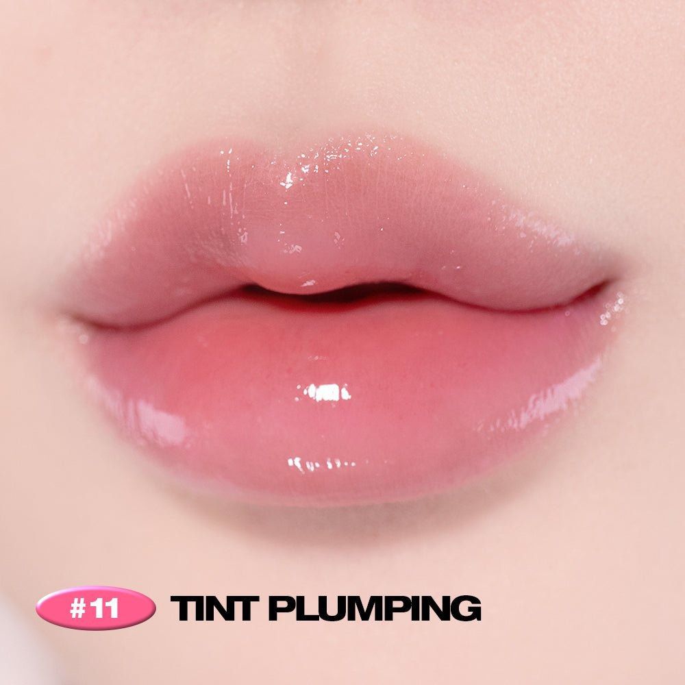 Nahaufnahme von glänzenden, rosa Lippen. Text: #11 TINT PLUMPING.