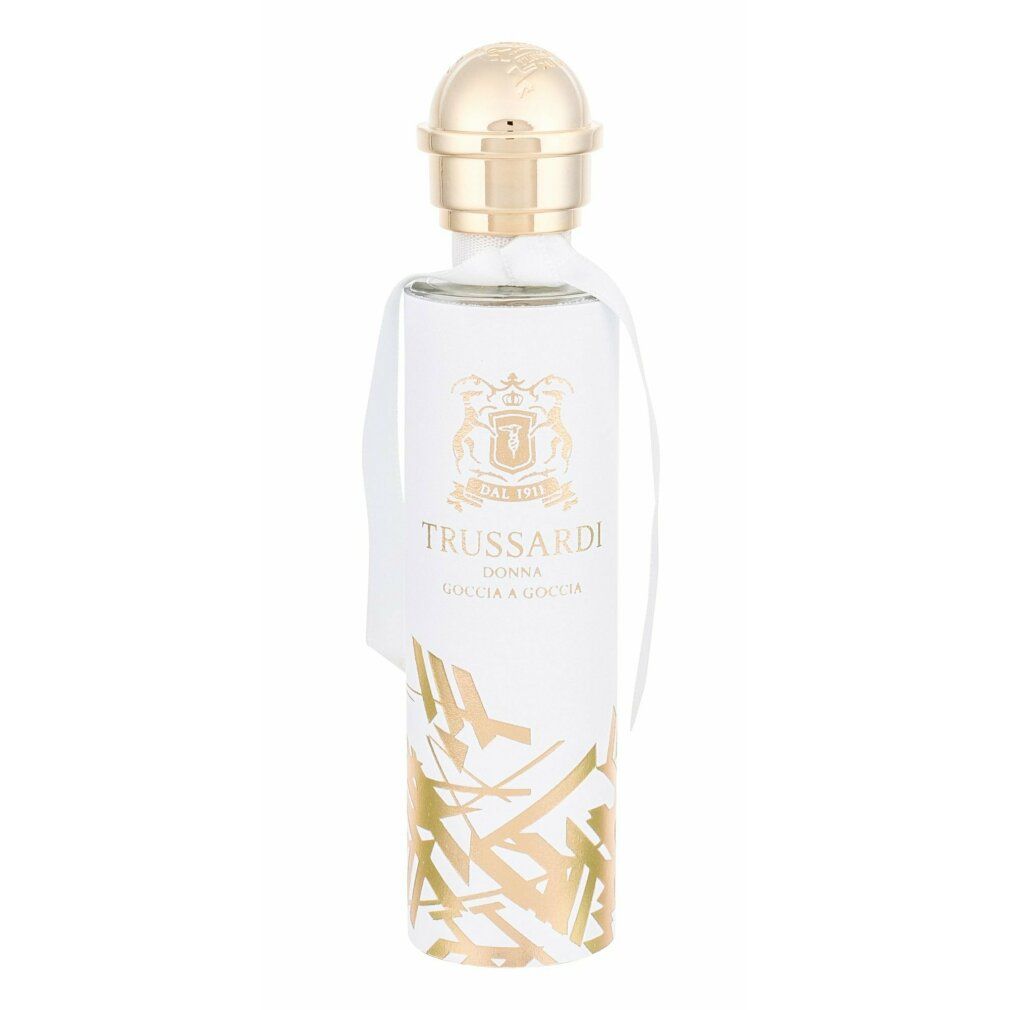 Parfümflakon mit weißer Aufschrift und goldenem Verschluss. Text: Trussardi Donna Goccia a Goccia. Mit weißem Band.