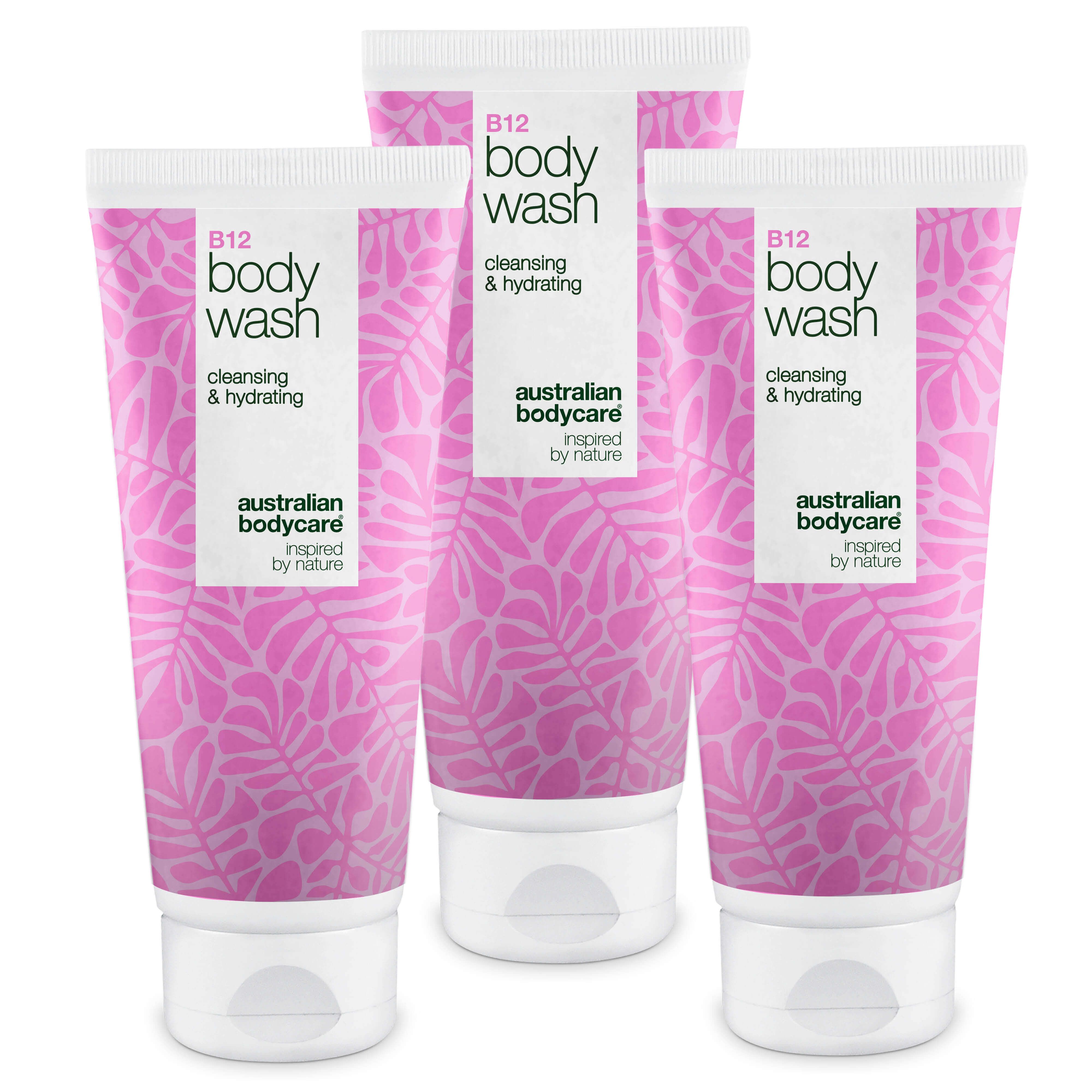 Trois tubes de gel douche B12 Australian Bodycare. Design rose avec des feuilles. Bouchon blanc et texte.
