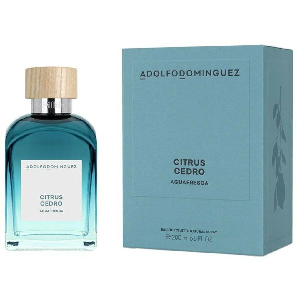 Blau-transparente Flasche mit Holzdeckel und rechteckiger Schachtel. Aufschrift: Adolfo Dominguez, Citrus Cedro, 200 ml.