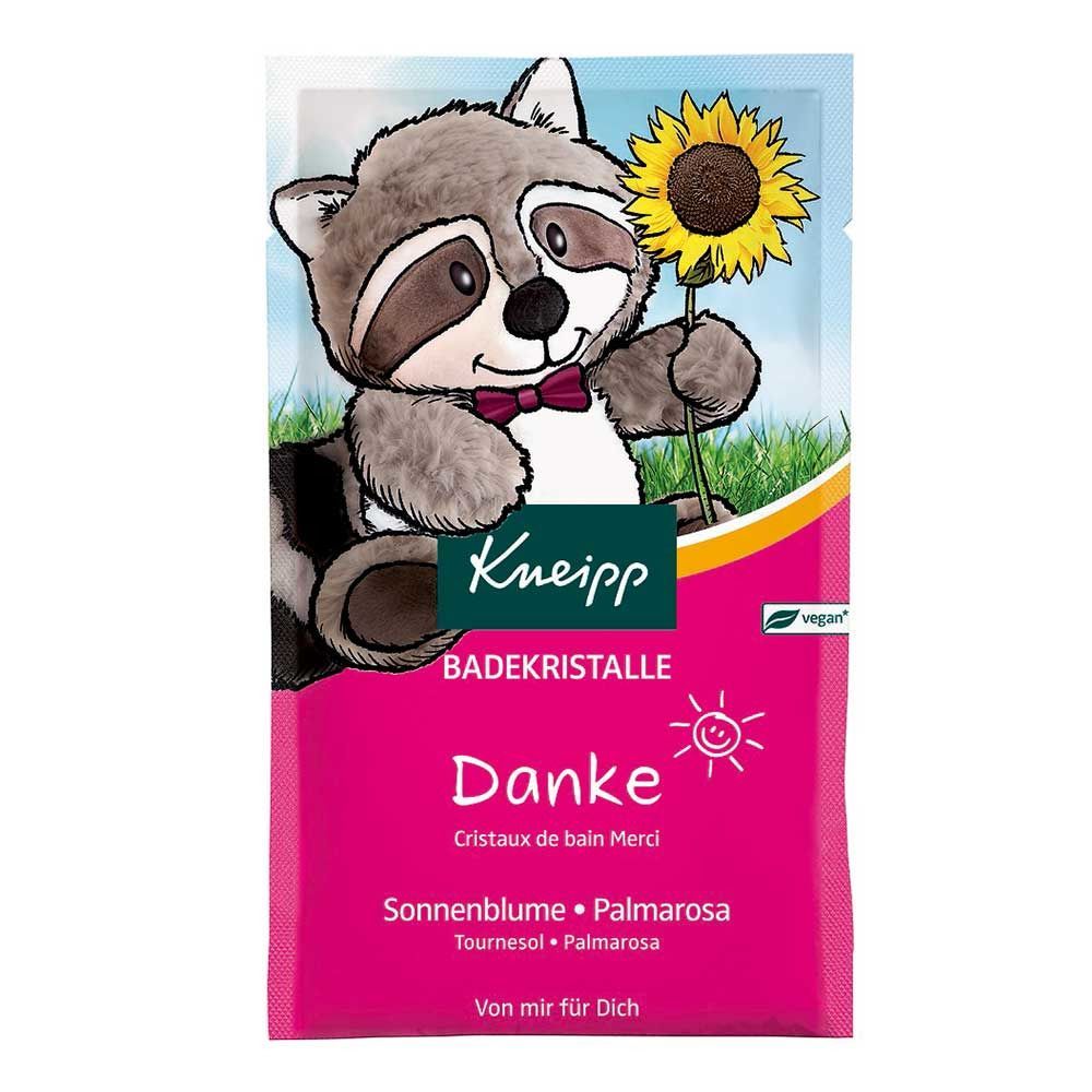 Rosa Beutel mit Aufdruck. Rabe mit Sonnenblume. Text: Kneipp Badekristalle Danke, Sonnenblume, Palmarosa. Vegan-Siegel.