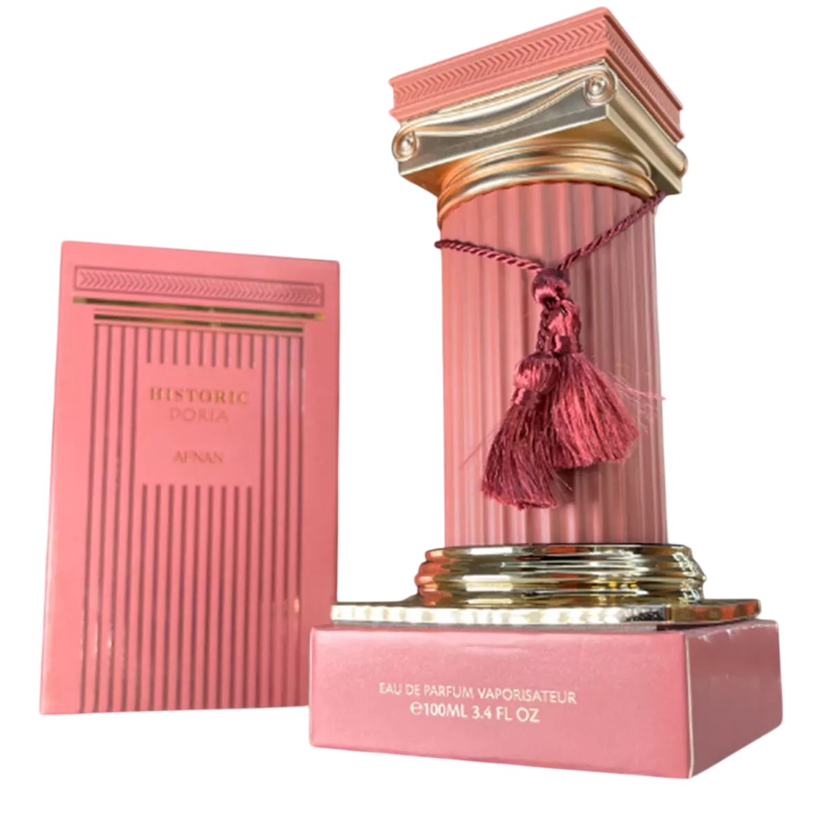 Parfümflakon in Säulenform mit Quaste und Verpackung. Rosa und goldfarbene Elemente. Aufschrift: Historic Doria, AFNAN.