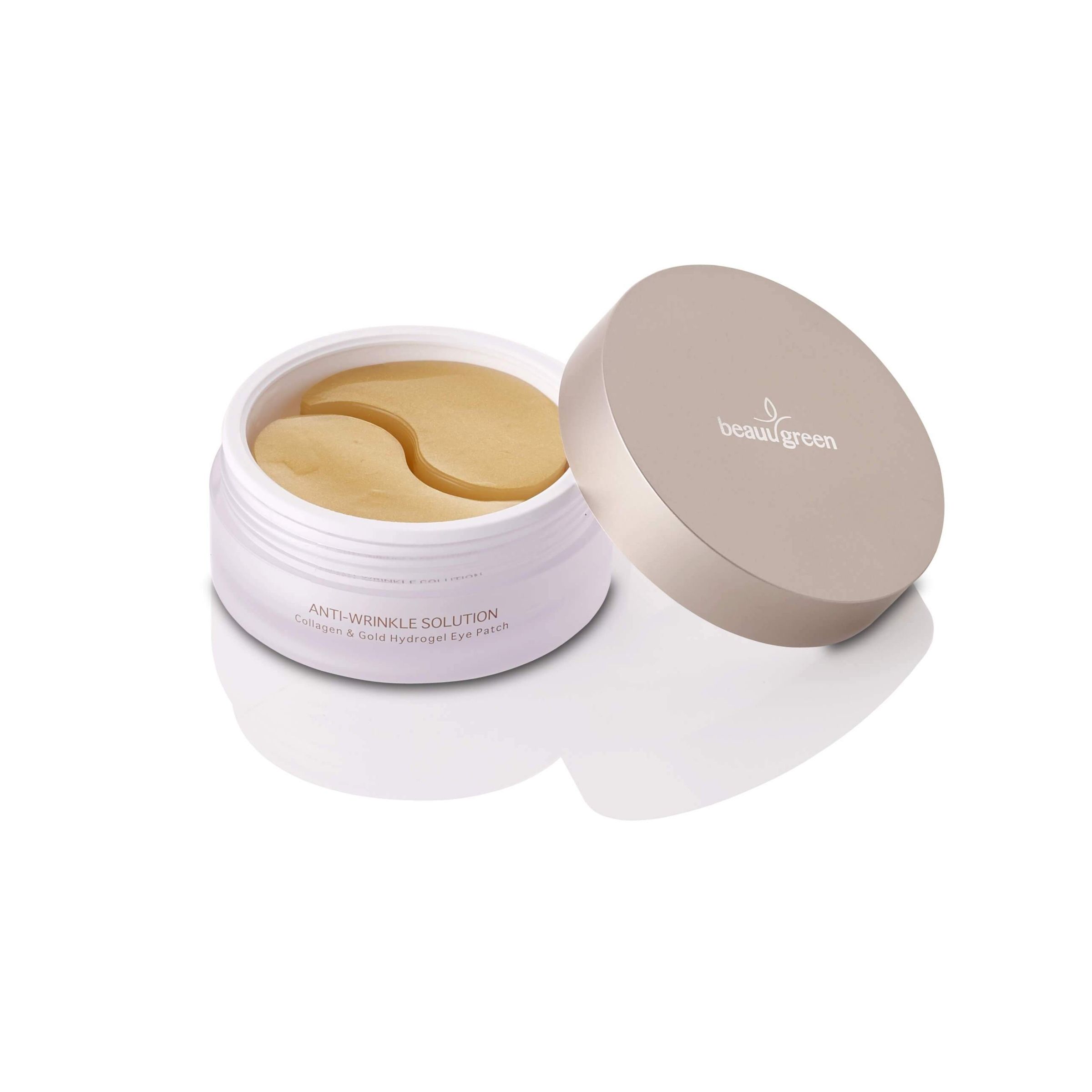 Behälter mit Augen-Pads. Deckel daneben. Aufschrift: Anti-Wrinkle Solution. Marke: Beauugreen.