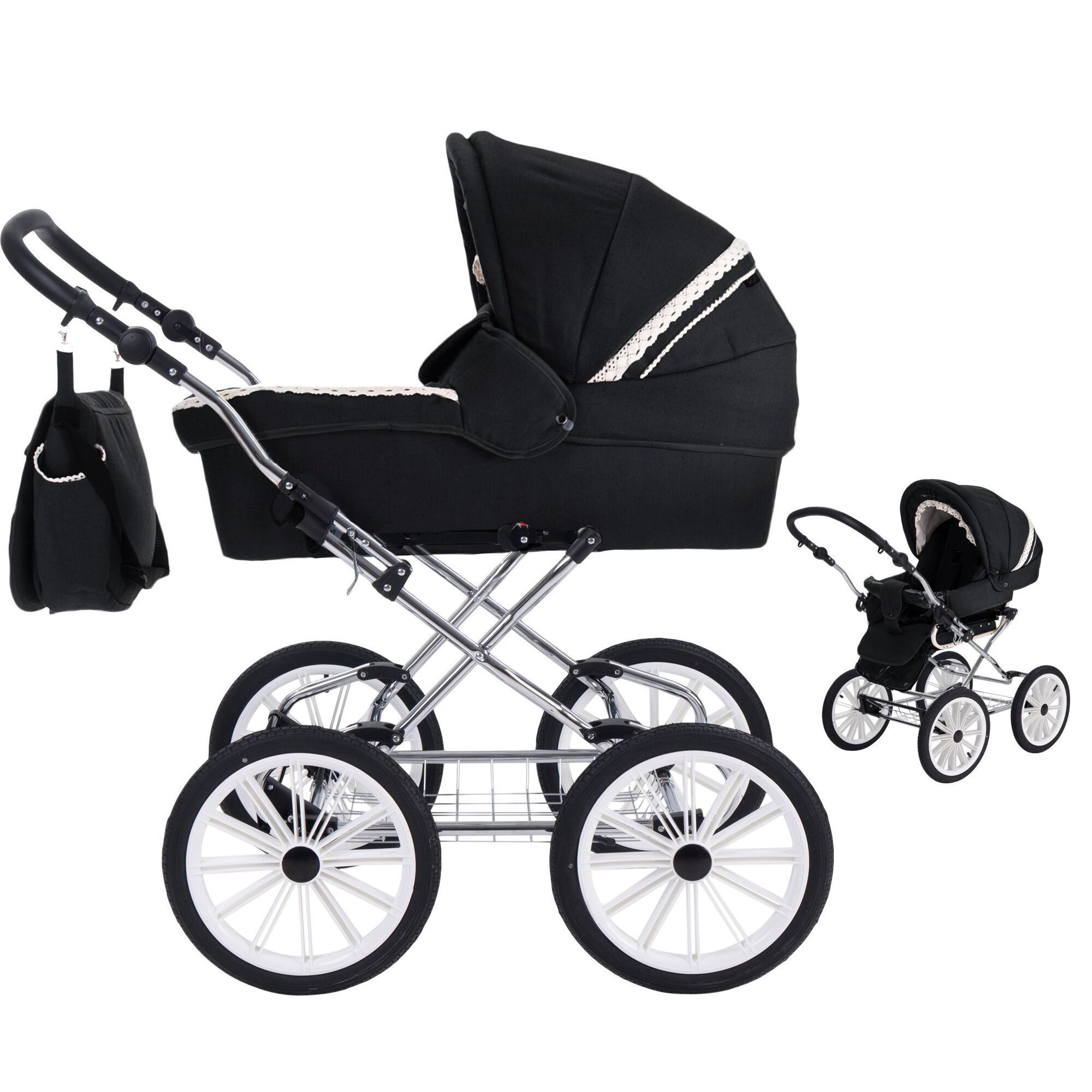 Kinderwagen in Schwarz mit weißen Rädern und silbernem Gestell. Eine separate Tasche hängt am Griff. Nostalgie-Design.
