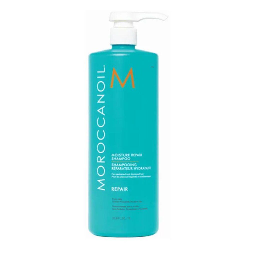Türkisfarbene Shampoo-Flasche mit weißem Pumpkopf. Aufschrift: Moroccanoil, Moisture Repair Shampoo, Repair. Orangefarbenes Logo.