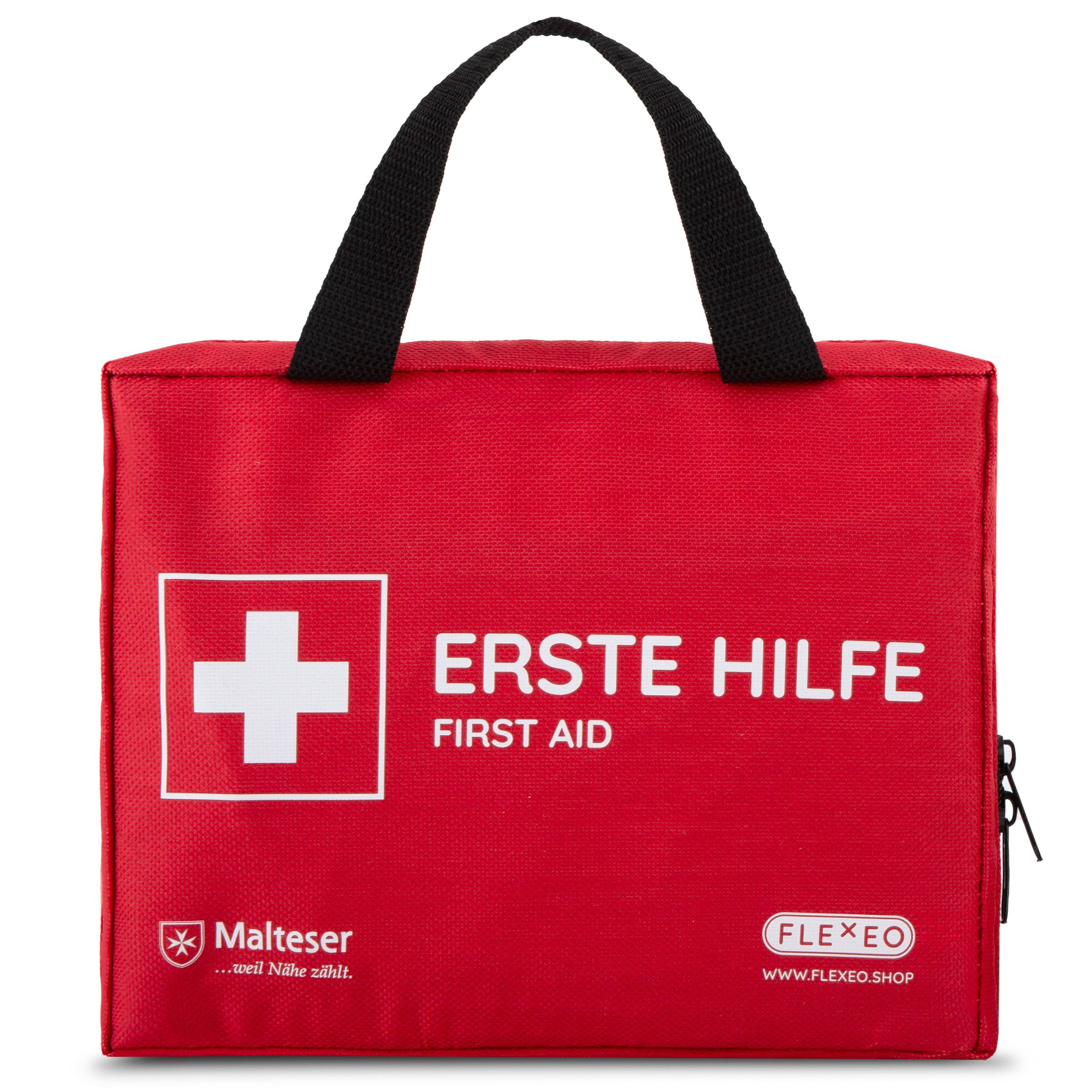 Rote Erste-Hilfe-Tasche mit weißem Kreuz und Aufschrift. Schwarzer Tragegriff. Reißverschluss.