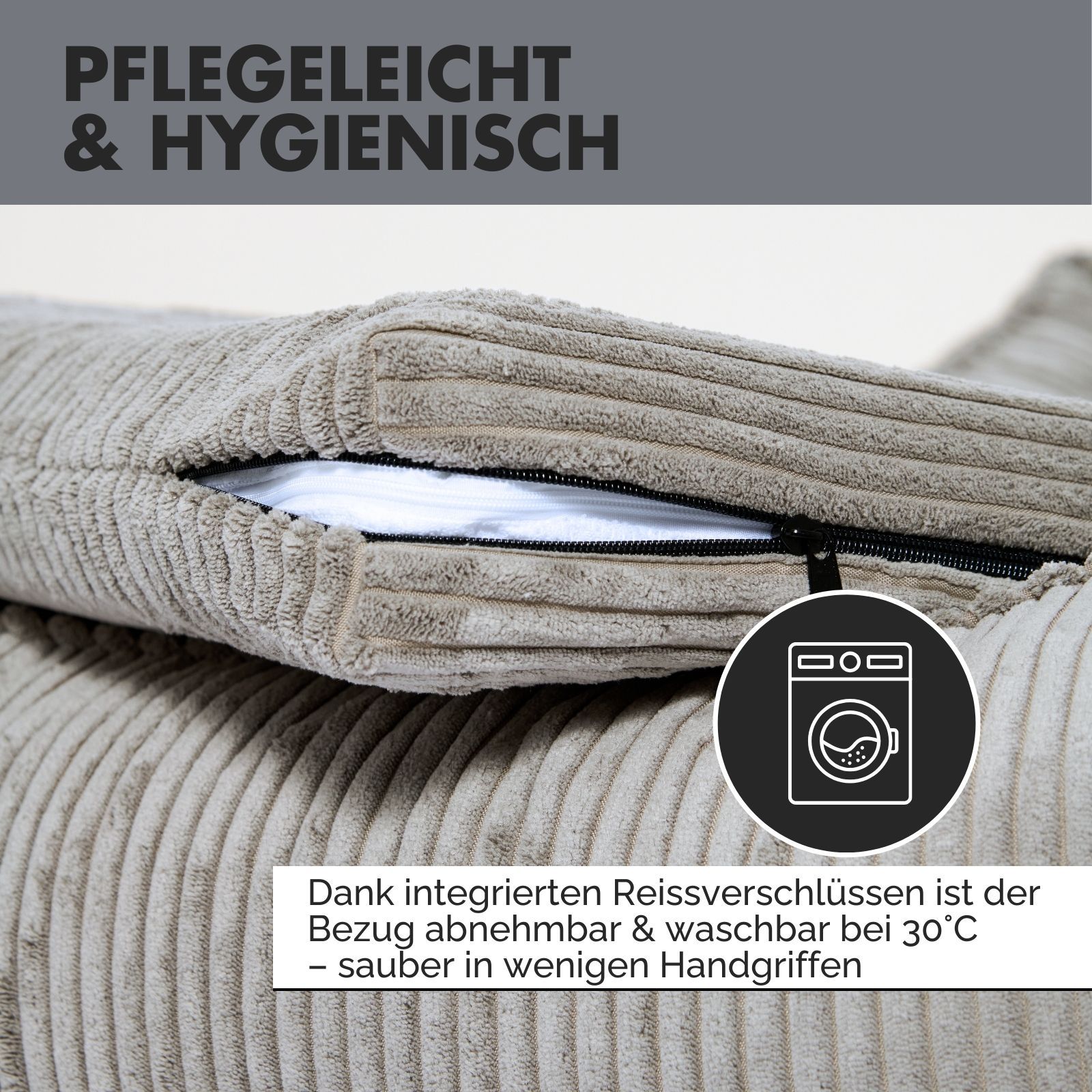 Nahaufnahme eines grauen Hundebetts mit Reißverschluss. Text: Pflegeleicht & hygienisch. Waschsymbol.
