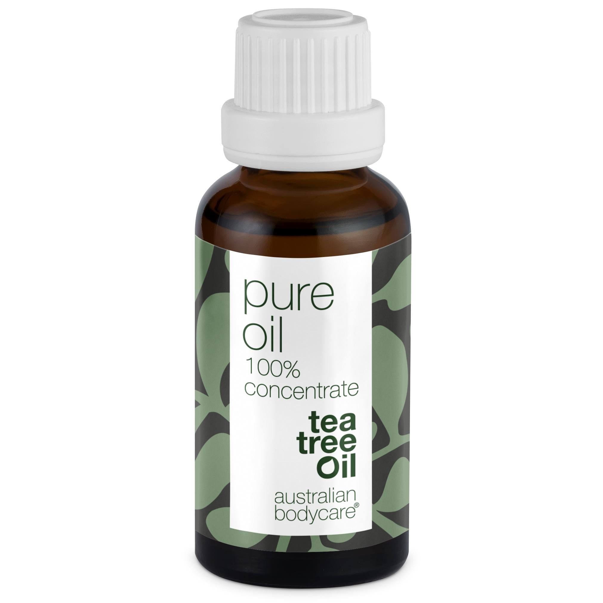 Braune Flasche mit weißem Deckel. Etikett mit Text: pure oil, 100% concentrate, tea tree oil, australian bodycare.
